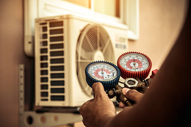 Professional Hvac technician working in Strafford, NH